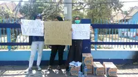 Aksi demo mahasiswa Gejayan Memanggil 2 kembali digelar di pertigaan Kolombo Gejayan Sleman dan menuntut sembilan hal kepada pemerintah. (Liputan6.com/ Switzy Sabandar)