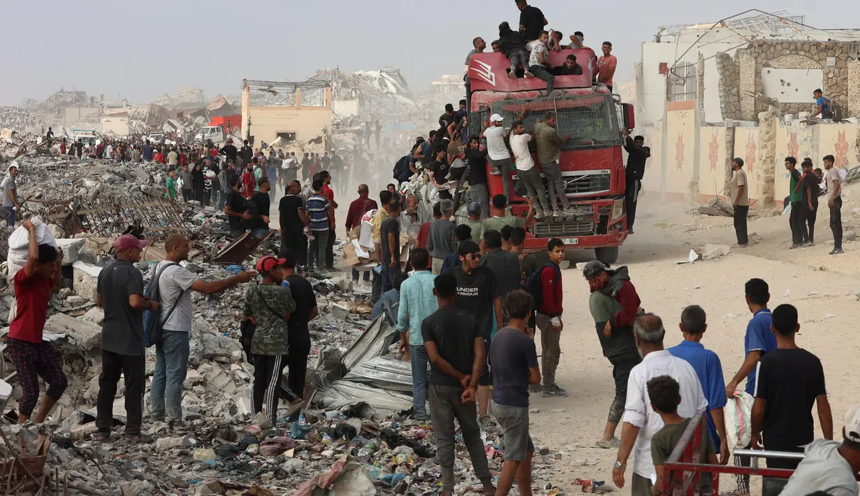 Juru bicara badan pertahanan sipil Gaza, Mahmud Bassal, pada Sabtu (21/6/2025), melaporkan sekitar 31 korban tewas di antaranya merupakan para pencari bantuan kemanusiaan di Gaza. (Omar AL-QATTAA/AFP)