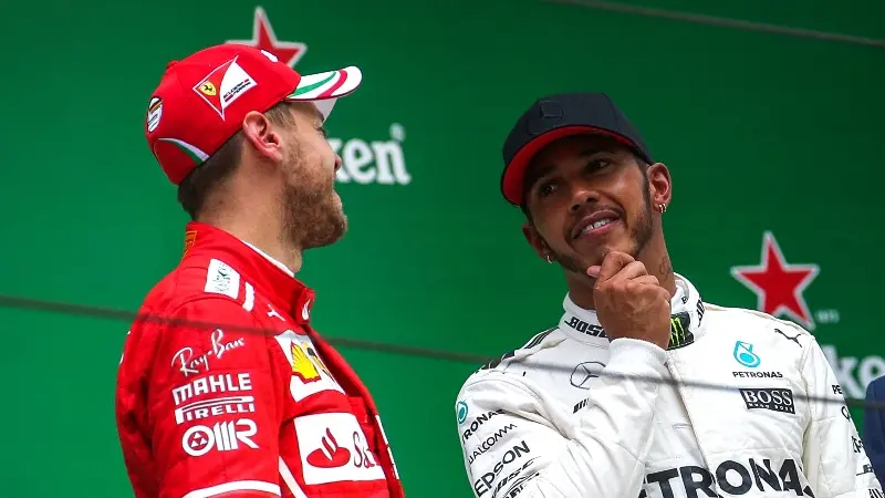 Lewis Hamilton dan Sebastian Vettel 