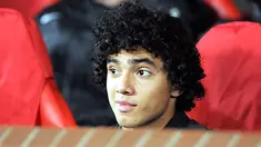Manchester United's Rafael Da Silva sits on the substitutes bench before their UEFA Champions League Group E match against Celtic at Old Trafford in Manchester, on October 21, 2008. AFP PHOTO/ANDREW YATES
