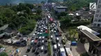 Libur kenaikan Isa Al Masih membuat sebagian warga berlibur ke luar kota. Salah satu kawasan yag dituju adalah Puncak, Bogor.