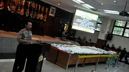 Dalam pengungkapan ini, polisi membekuk 4 tersangka yang diduga jaringan internasional, Jakarta, (10/10/14). (Liputan6.com/Johan Tallo)