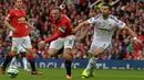 Jordi Amat pernah bermain di Liga Inggris memperkuat Swansea City pada tahun 2013 hingga 2017. Bermain sebagai bek tengah, Jordi Amat sudah pasti tentu menjaga pemain hebat di Liga Inggris saat itu. (AFP/Paul Ellis)