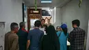 Diketahui, sejak 15 Oktober 2024, harga emas Antam di situs Sahabat Pegadaian sudah naik sekitar Rp1,1 juta. (Juni KRISWANTO/AFP)