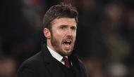 Legenda lini tengah Old Trafford itu akan memimpin The Red Devils hingga akhir musim ini. Tampak dalam foto, Michael Carrick saat masih menjadi pelatih sementara Manchester United memberi isyarat di pinggir lapangan selama pertandingan sepak bola Liga Premier Inggris melawan Arsenal di Old Trafford, Manchester, Inggris barat laut, pada 2 Desember 2021. (Oli SCARFF/AFP)