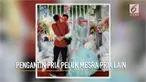 Foto pengantin pria memeluk pria lain di atas pelaminan bikin warganet geli.
