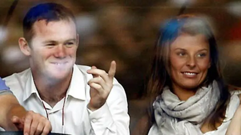 Wayne Rooney dan istri, Coleen McLoughlin. (AFP/Paul Ellis)
