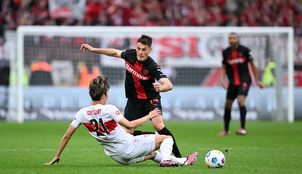 Leverkusen yang sudah menjadi juara kini mengumpulkan 81 poin di puncak klasemen Bundesliga dari 31 laga. (INA FASSBENDER / AFP)