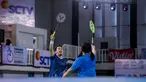 Mantan pebulu tangkis Indonesia, Mohammad Ahsan (kiri) dan penyanyi sekaligus selebritas Indonesia, Ziva Magnolya melakukan selebrasi setelah mencetak poin pada laga semifinal Turnamen Olahraga Selebriti Indonesia (TOSI) Season 4 melawan pasangan mantan pebulu tangkis Indonesia, Debby Susanto dan selebritas, Rafael Tan di GOR UNJ, Rawamangun, Jakarta, Minggu (02/11/2025). (Bola.com/Bagaskara Lazuardi)