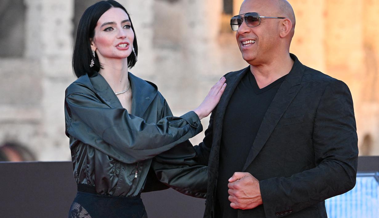 Aktris AS Meadow Walker dan aktor AS Vin Diesel tiba untuk pemutaran perdana film "Fast X", film kesepuluh dalam Fast & Furious Saga, di monumen Colosseum di Roma pada 12 Mei 2023. (AFP/Alberto Pizzoli)