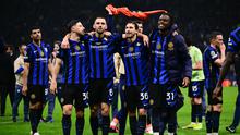 Inter Milan sukses melaju ke final Liga Champions 2024/2025 usai mengalahkan Barcelona dengan skor 4-3 (agregat 7-6). (Marco BERTORELLO/AFP)