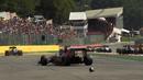 Mobil pebalap Toro Rosso, Carlos Sainz Jr, mengalami kerusakan setelag start F1 GP Belgia di di Sirkuit Spa-Francorchamps, Minggu (28/8/2016). (AFP/John Thys)