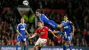 Pemain MU, Ander Herrera, berebut bola dengan pemain Ipswich Town, Jay Tabb, dalam laga putaran ketiga Piala Liga Inggris di Stadion Old Trafford, Manchester, Inggris, Kamis (24/9/2015) dini hari WIB. (Reuters/Andrew Yates)