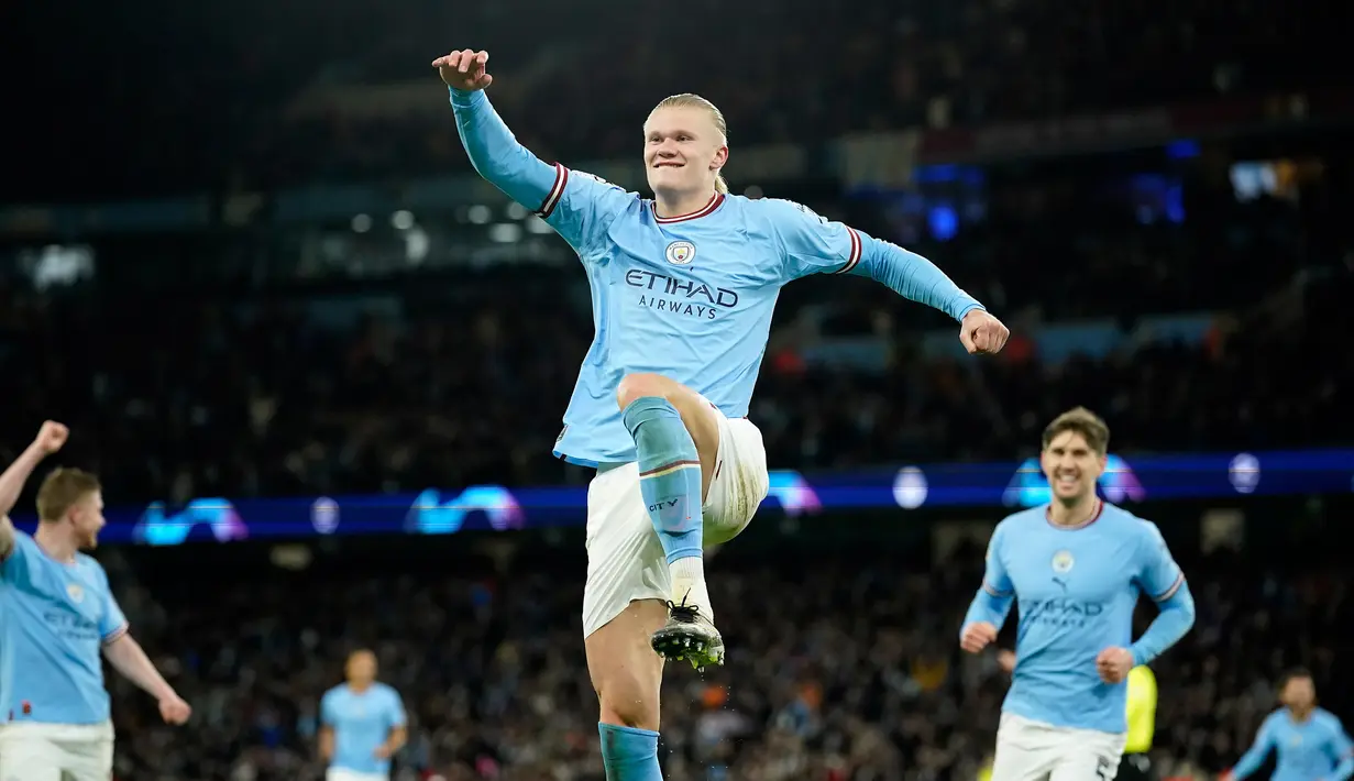 Pemain Manchester City Erling Haaland melakukan selebrasi usai mencetak gol ke gawang RB Leipzig pada pertandingan sepak bola leg kedua babak 16 besar Liga Champions di Etihad Stadium, Manchester, Inggris, 14 Maret 2023. Laga berakhir 7-0 dan membawa Manchester City lolos ke perempat final Liga Champions dengan agregat 8-1. (AP Photo/Dave Thompson)