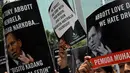 Para demonstran membentangkan poster dan spanduk selama aksi unjuk rasa di depan Kedubes Australia, Jakarta, Rabu (25/2/2015). Massa memprotes pernyataan Tony Abbott terkait dua terpidana mati Andrew Chan dan Myuran Sukumaran. (Liputan6.com/JohanTallo)