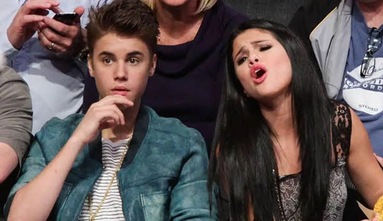 Justin Bieber mengekspresikan rasa cintanya pada Selena Gomez dengan menggamar tato wajah Selena di pergelangan tangan kirinya. (hit.com.au)