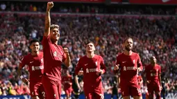 Pemain Liverpool merayakan gol yang dicetak oleh Roberto Firmino (kedua kiri) pada laga lanjutan Liga Inggris 2022/2023 antara Liverpool melawan Bournemouth di Anfield, Liverpool, 27 Augustus 2022. The Reds sukses meraih 9 kemenangan kandang dari 28 laga Liga Inggris musim ini. (AFP/Oli Scarff)