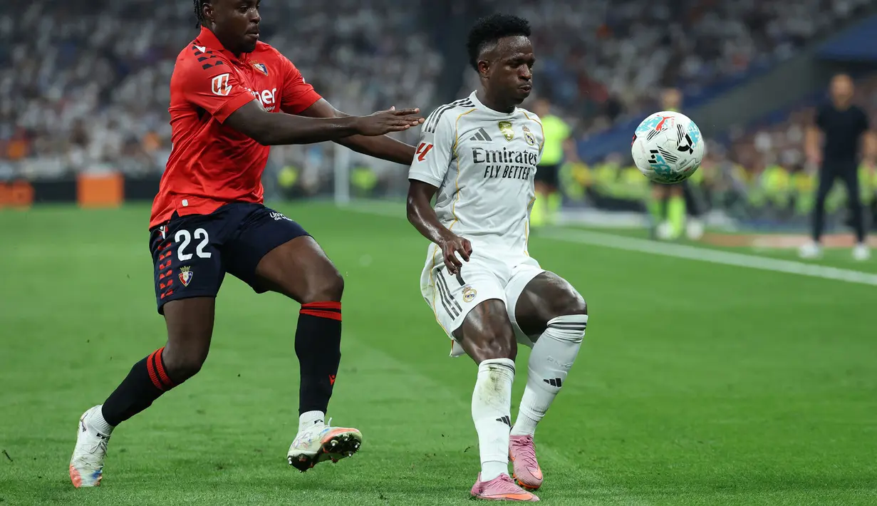 Dikutip ESPN, Vinicius melalui dua agennya Fred Pena dan Thassilo Soares kembali mengajukan nilai kontrak baru dengan Real Madrid, tetapi tawaran tersebut berakhir nihil. (AFP/Thomas Coex)
