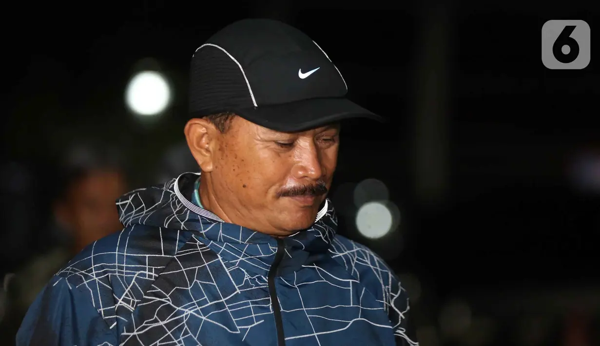 Hingga kini, pihak KPK belum menyampaikan secara rinci konstruksi perkara yang menjerat Wali Kota Madiun, Maidi. Tampak dalam foto, Wali Kota Madiun, Maidi saat tiba di Gedung Merah Putih Komisi Pemberantasan Komisi Pemberantasan Korupsi (KPK), Jakarta, Senin (19/1/2026). (Liputan6.com/Helmi Fithriansyah)