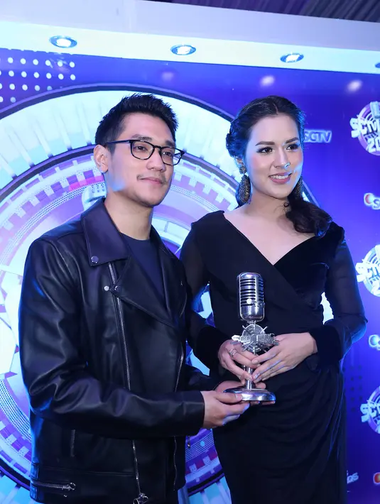 Raisa dan Afgan tentunya belum merasa puas, mereka tetap menyuguhkan kolaborasi terbaik dan tak berhenti untuk menciptakan suatu nuansa karya. (Nurwahyunan/Bintang.com)