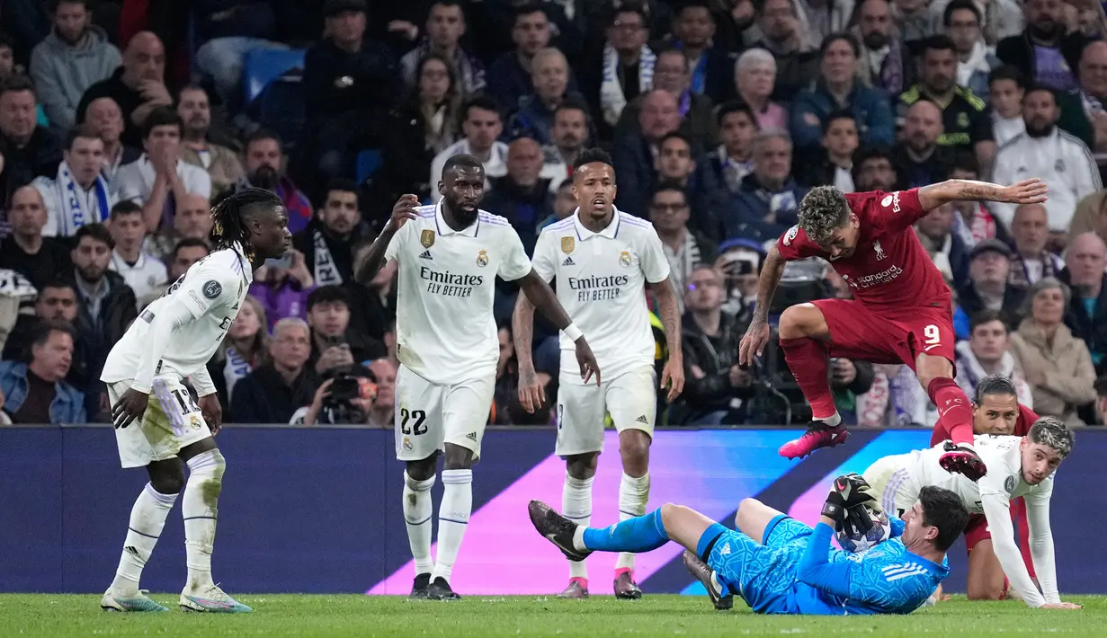 Dengan kemenangan ini, Real Madrid berhasil lolos dengan agregat 6-2 atas Liverpool. (AP Photo/Bernat Armangue)
