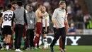 Pelatih Liverpool Jurgen Klopp tersenyum saat merayakan timnya lolos ke final Liga Champions di Stadion Olimpiade, Roma (2/5). Liverpool takluk 4-2 atas Roma di leg kedua  dan melaju ke final usai menang agregat 7-6. (AP Photo/Alessandra Tarantino)