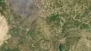 Menurut outlet Yunani, NewsIT, api masih menyala pada hari Senin, setelah menghanguskan sekitar 20.000 hektar. (Planet Labs PBC / AFP)