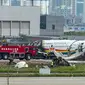 Pesawat Tibet Airlines terbakar setelah tergelincir dari landasan pacu di kota Chongqing, China barat daya pada Kamis, (12/5/2022)(Dok.Xinhua)