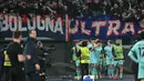 Pemain Bologna merayakan gol yang dicetak Santiago Castro pada pertandingan leg kedua 16 besar Liga Europa 2025/2026 melawan AS Roma di Stadion Olimpico, Kamis (19/3/2026) waktu setempat atau Jumat 20 Maret 2026 dini hari WIB. Bologna lolos ke perempat final Liga Europa 2025/2026 setelah mengalahkan AS Roma 4-3. (Alberto PIZZOLI/AFP)
