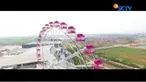 Bianglala berwarna pink dengan tinggi 69 meter ini terletak di mall kawasan Cakung, Jakarta Timur. Wahana ini terdiri dari 32 gondola.