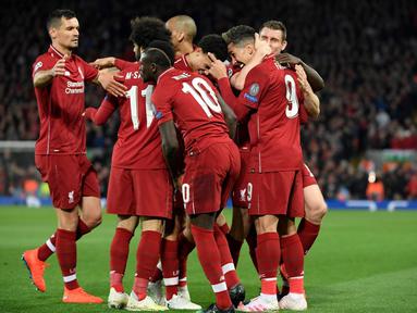 Selebrasi golpertama Liverpool yang dicetak Nabi Keita pada leg 1, babak perempat final Liga Champions yang berlangsung di Stadion Anfield, Liverpool, Rabu (10/4). Liverpool menang 2-0 atas Porto (AFP/Glyn Kirk)