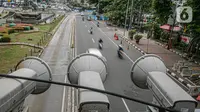 Kamera Closed Circuit Television (CCTV) terpasang di Jalan MH Thamrin, Jakarta, Sabtu (23/1/2021). Direktorat Lalu Lintas Polda Metro Jaya menargetkan 100 kamera electronic traffic law enforcement (ETLE) terpasang di sejumlah ruas jalan di Jakarta pada 2021. (Liputan6.com/Faizal Fanani)