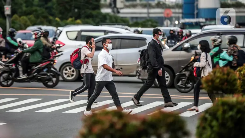 FOTO: Pemerintah Umumkan Pelonggaran Pemakaian Masker di Luar Ruangan