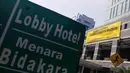 Aksi tersebut untuk mengingatkan dan memperkuat komitmen perlindungan dan pemulihan lingkungan pada debat capres-cawapres putaran terakhir bertema 'Pangan, Energi dan Lingkungan', Jakarta. (Liputan6.com/Faizal Fanani)