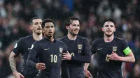 Pemain Timnas Inggris saat menghadapi Belgia dalam laga uji coba internasional yang digelar di Wembley, Rabu (27/3/2024) dini hari WIB. (Adrian DENNIS / AFP)