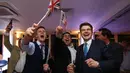 Pendukung Brexit bersorak di pesta Leave.UE setelah melihat hasil penghitungan sementara referendum Inggris yang menunjukkan mayoritas rakyat Inggris memilih “Brexit” alias keluar dari Uni Eropa, di London, Kamis (23/6). (GEOFF CADDICK/AFP)