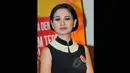 Penyanyi jazz Andien disela-sela acara penerimaan rekor Museum Rekor Dunia Indonesia (MURI) di kawasan Kemang, Jakarta, Selasa (24/2/2015). (Liputan6.com/Panji Diksana)