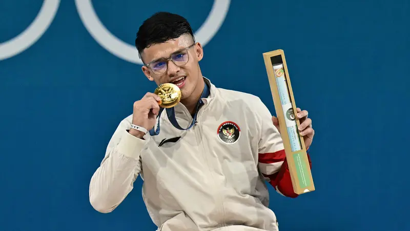 Raih Emas Angkat Besi Olimpiade Paris 2024, Rizki Juniansyah Cetak Sejarah dan Pecahkan Rekor "Clean and Jerk"