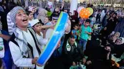 Diperingati pada tanggal 12 Rabiul Awal setiap tahunnya, ini merupakan tanggal kelahiran Rasulullah SAW di Kota Mekah. (AP Photo/Hadi Mizban)