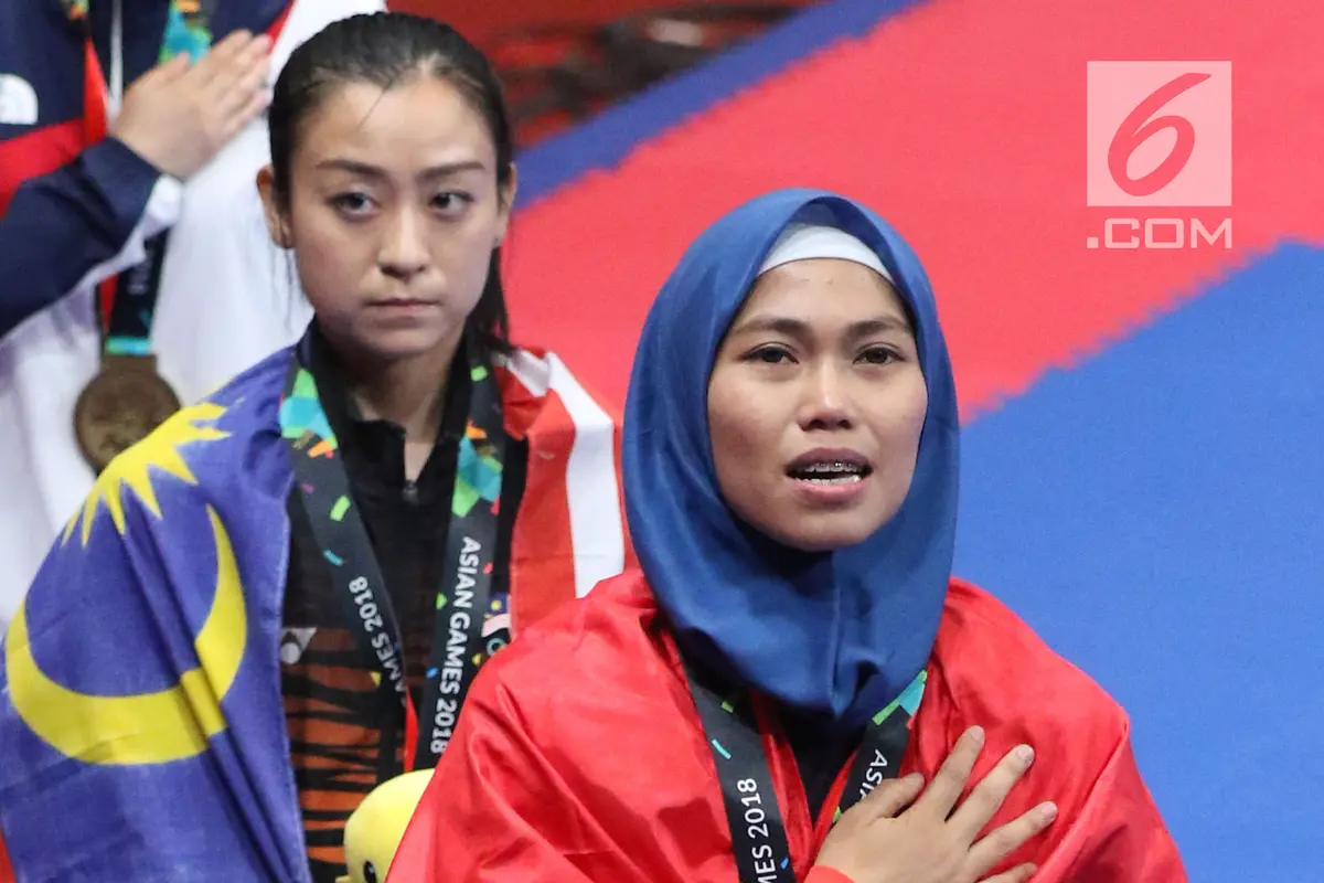 Ekspresi Defia Rosmaniar Saat Raih Emas