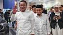 Pasangan bakal calon gubernur dan wakil gubernur DKI Jakarta, Ridwan Kamil dan Suswono saat tiba untuk menjalani pemeriksaan kesehatan di RSUD Tarakan, Jakarta, Jumat (30/8/2024). (Liputan6.com/Angga Yuniar)