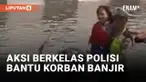 Salut! Polisi Bantu Ibu-ibu yang Terjebak Banjir