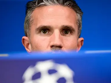 Pelatih baru Feyenoord Robin van Persie optimis dengan berjuang keras anak asuhnya bisa membuat kejutan saat bertandang ke markas Inter Milan pada leg kedua 16 besar Liga Champions, Rabu (12/3/2025). (AFP/Piero Cruciatti)