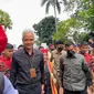 Bakal calon presiden Ganjar Pranowo tiba di Tugu Proklamasi, Jakarta Pusat, Kamis (19/10/2023). (Liputan6.com/Delvira Hutabarat)
