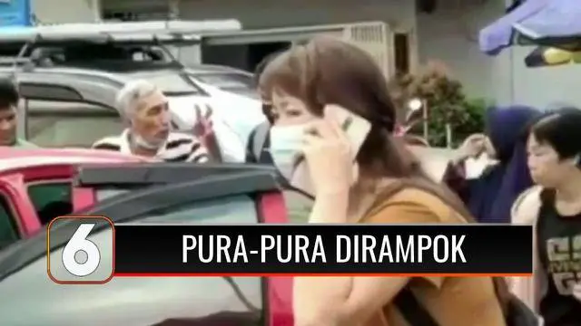 Sambil sibuk menelpon dan menangis, wanita ini mengaku dirinya menjadi korban perampokan dan telah kehilangan uang Rp 300 juta dari mobilnya. Gak tahunya uang ratusan juta milik orang lain tersebut dipakai untuk judi online.