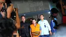 Bupati Bogor, Rachmat Yasin keluar Gedung KPK memakai rompi oranye yang merupakan baju kebesaran tahanan KPK  (Liputan6.com/Faisal R Syam)