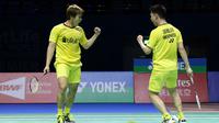 Kevin Sanjaya Sukamuljo/Marcus Fernaldi Gideon mengalahkan ganda kuat China, Liu Cheng/Zhang Nan, dalam dua gim langsung, 21-16, 21-15, pada final BWF Super Series Finals 2017, Minggu (17/12/2017). (PBSI)
