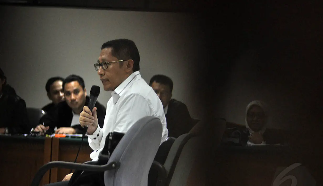 Anas Urbaningrum menjalani sidang lanjutan terkait kasus hambalang di Pengadilan Tipikor, Kamis (4/9/14). (Liputan6.com/Miftahul Hayat) 