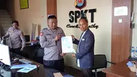 Polda Banten menerima laporan polisi terhadap Ken Setiawan dan Herri atas tudingan pencemaran nama baik dan pelanggaran Undang-undang (UU) ITE. (Liputan6.com/Yandhi Deslatama)