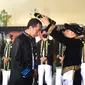 Presiden Joko Widodo atau Jokowi mengatakan gelar adat yang diterimanya dari Kesultanan Ternate dan Kesultanan Buton, menujukkan keberagaman Indonesia.